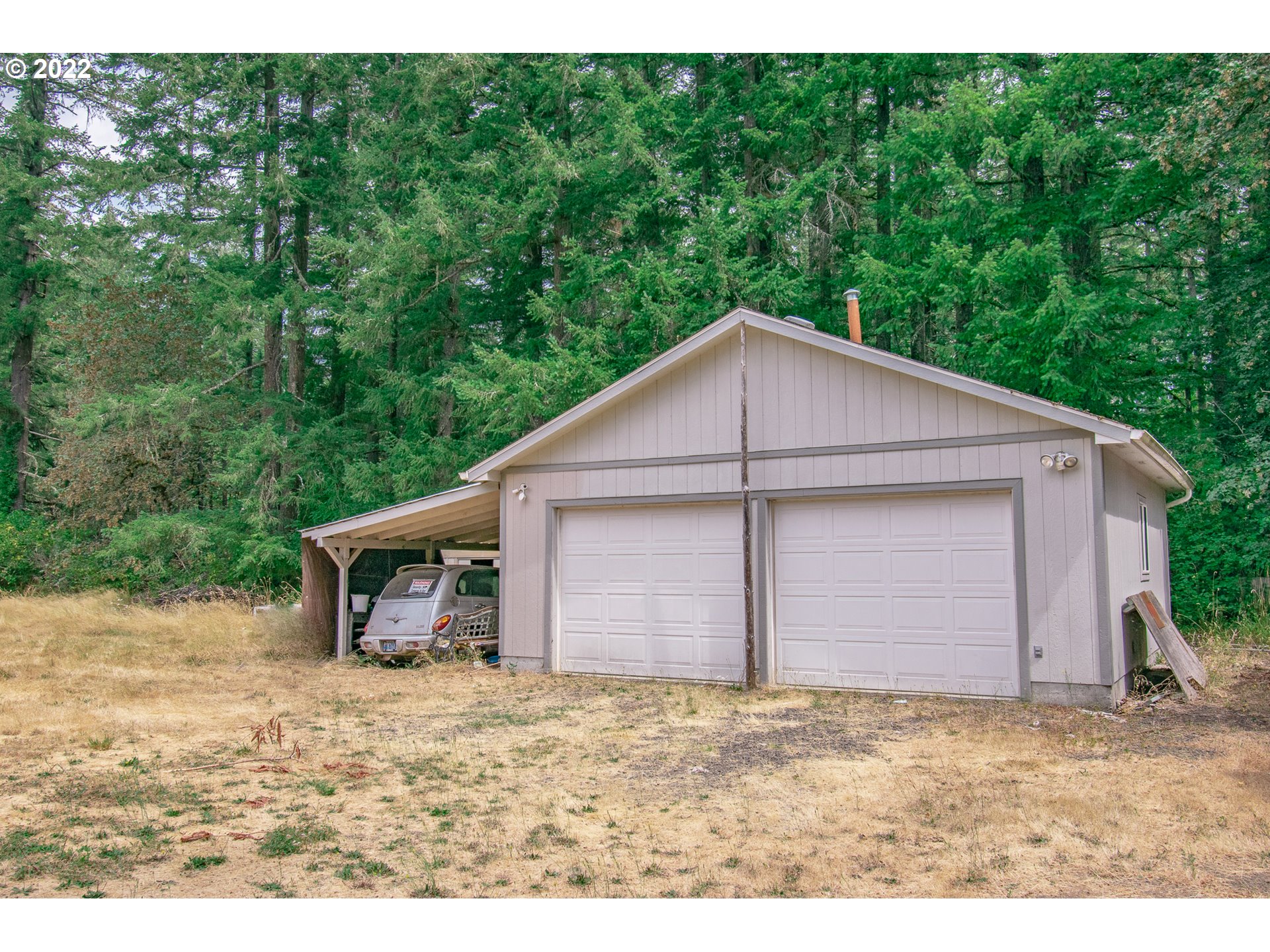 38435 Row River Road Dorena, OR 97434 - Photo 20 of 32 a house with a outdoor space