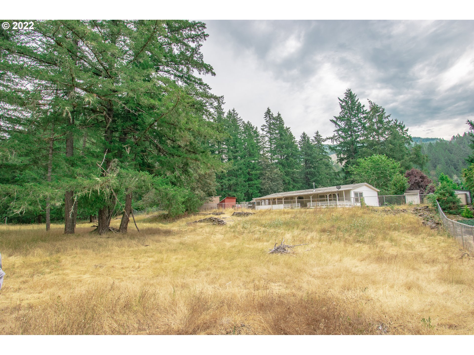 38435 Row River Road Dorena, OR 97434 - Photo 23 of 32 a view of swimming pool with a yard