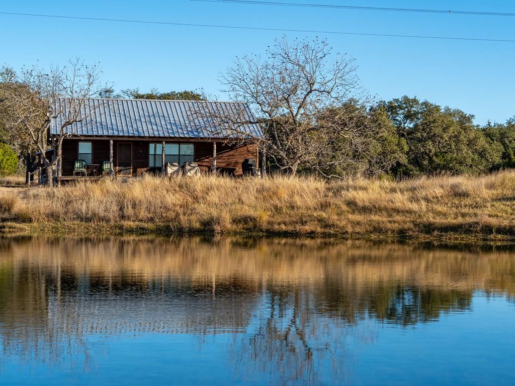 a view of a house with a lake view