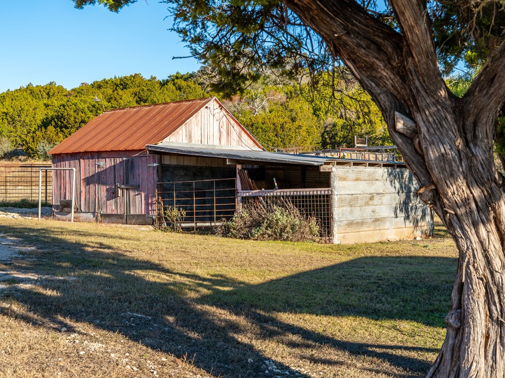 196 Hermit Hill Road Fredericksburg, TX 78624 - Photo 33 of 49 a front view of a house with a yard