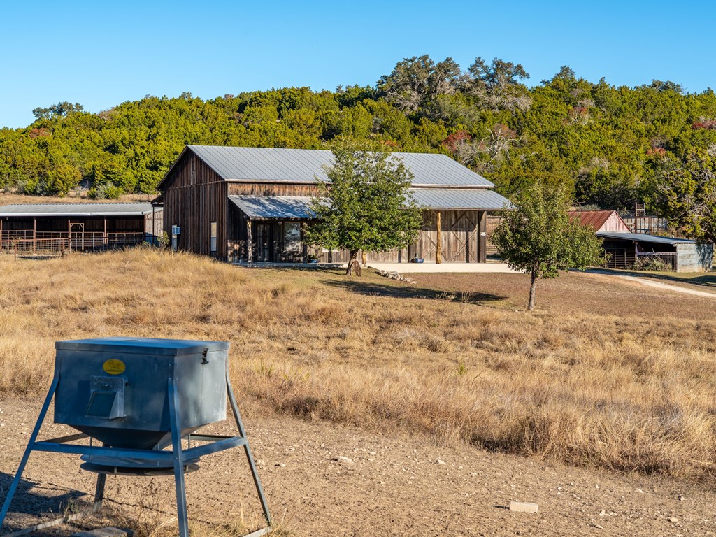 196 Hermit Hill Road Fredericksburg, TX 78624 - Photo 37 of 49 a house view with a backyard space