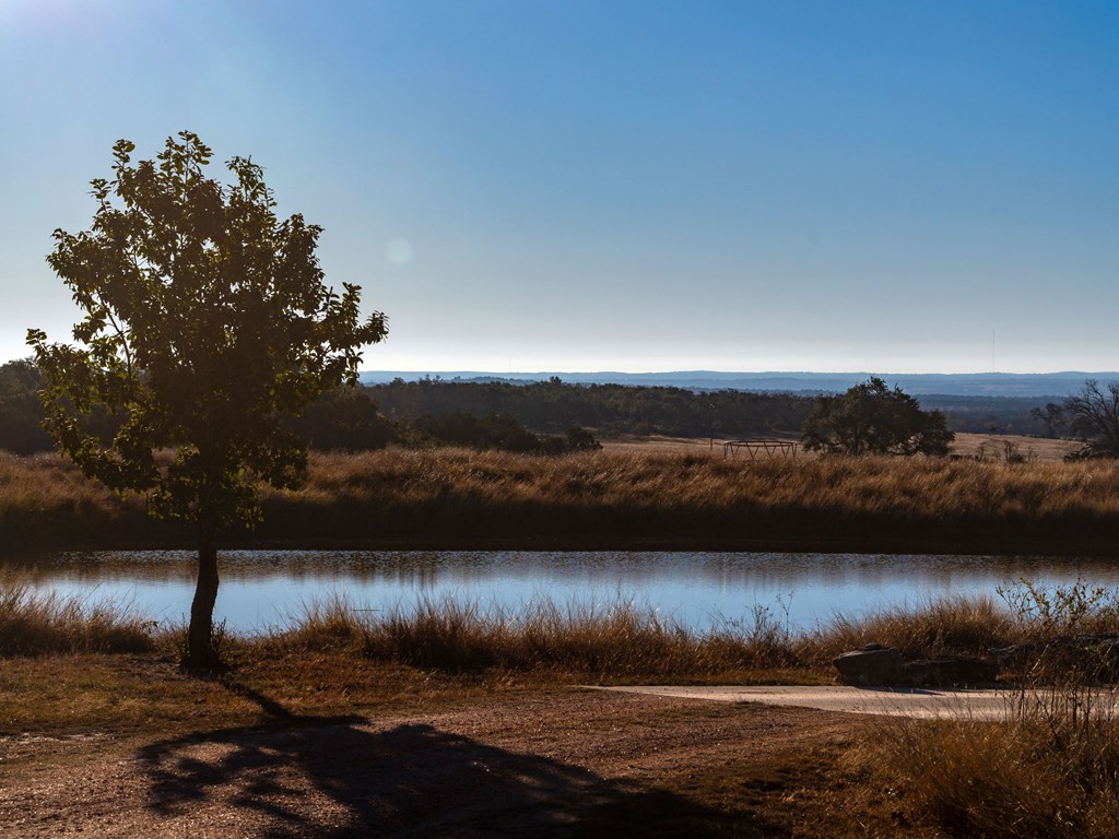 196 Hermit Hill Road Fredericksburg, TX 78624 - Photo 44 of 49 a view of lake with green space