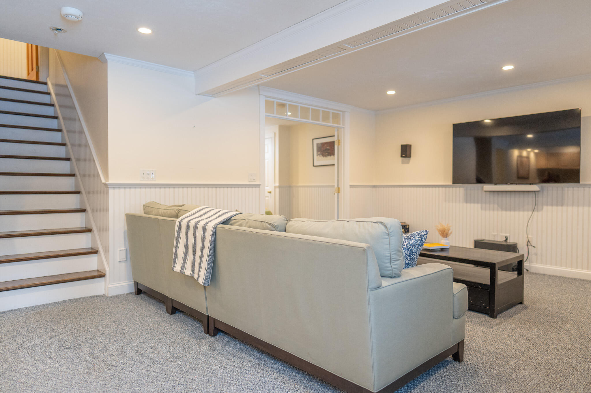 10 Abbey Gate Road Cotuit, MA 02635 - Photo 53 of 67 a living room with furniture and a flat screen tv