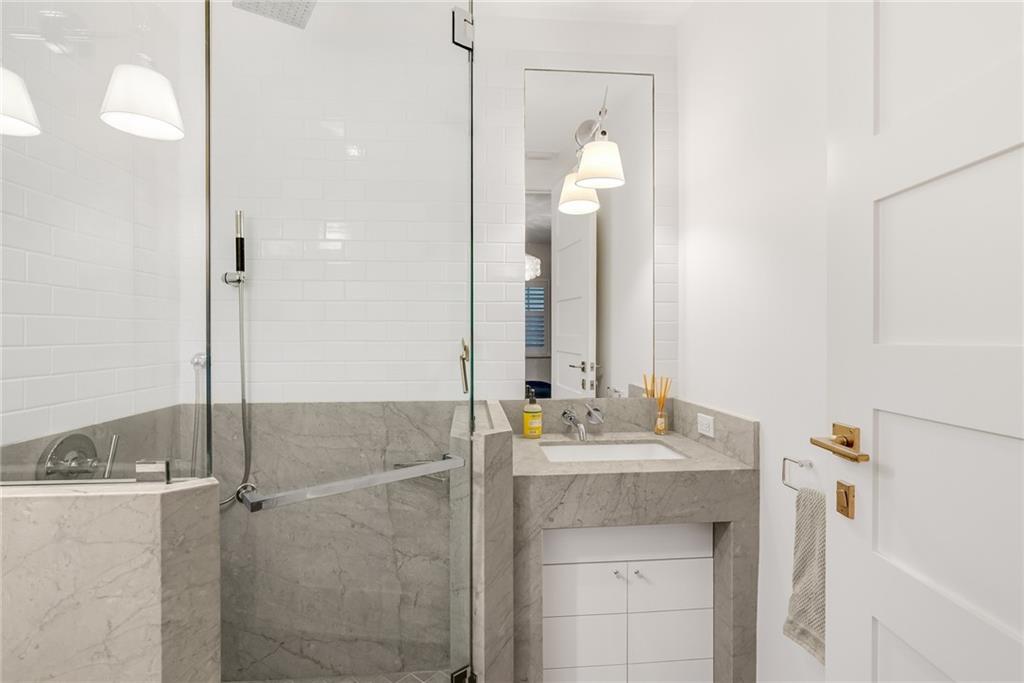 850 Beach Road, Unit 176 Indian River Shores, FL 32963 - Photo 11 of 18 a bathroom with a bathtub and a sink