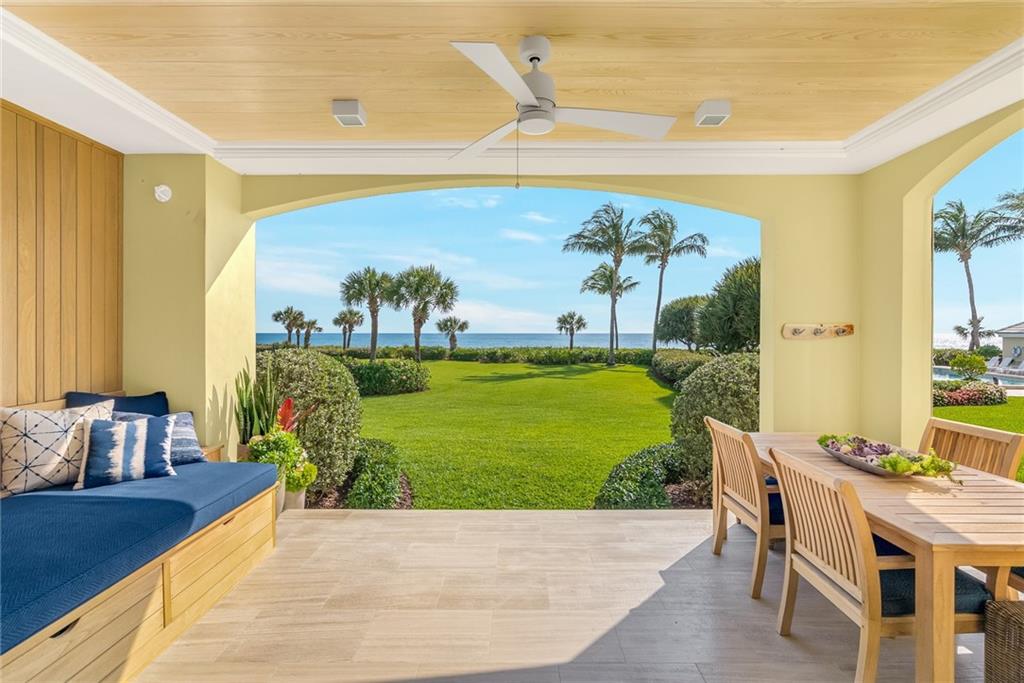 850 Beach Road, Unit 176 Indian River Shores, FL 32963 - Photo 12 of 18 a living room with furniture and garden view