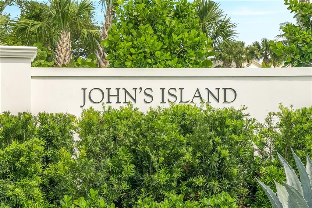 850 Beach Road, Unit 176 Indian River Shores, FL 32963 - Photo 13 of 18 a sign broad on the street