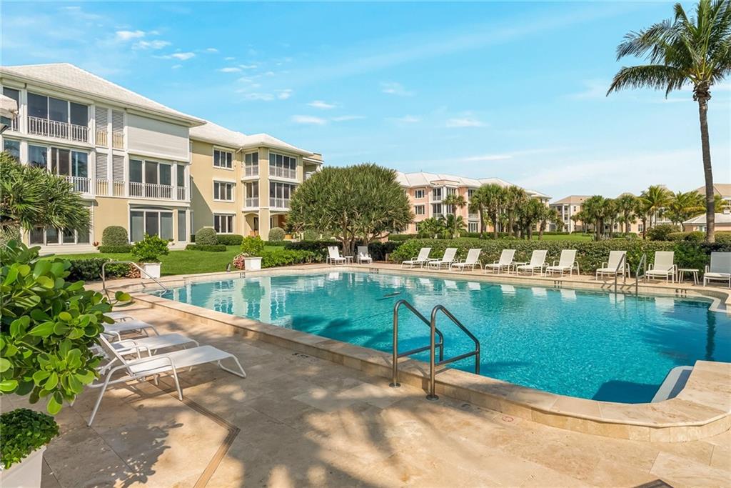 850 Beach Road, Unit 176 Indian River Shores, FL 32963 - Photo 16 of 18 a view of a lake with a house
