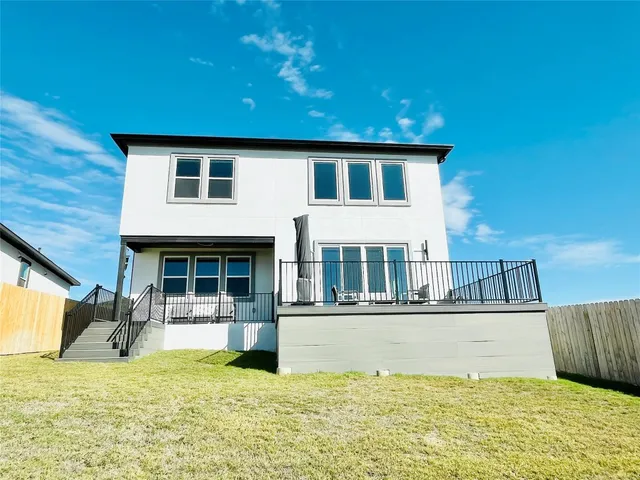 a view of a house with a swimming pool