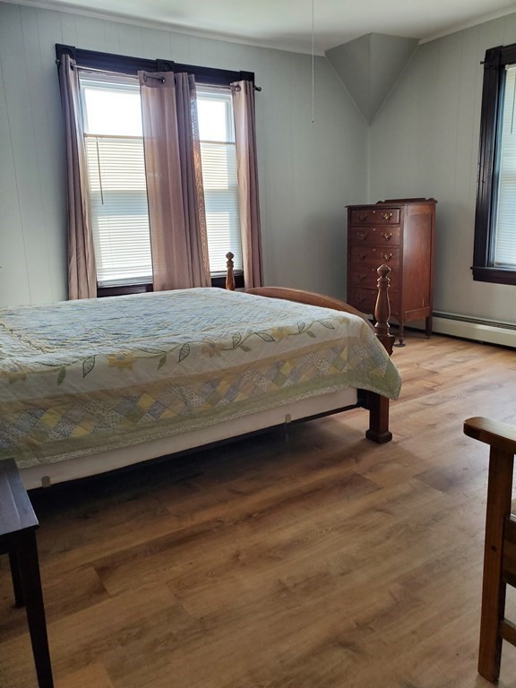 20 Baker Street Gardner, MA 01440 - Photo 11 of 15 a bedroom with a bed and window