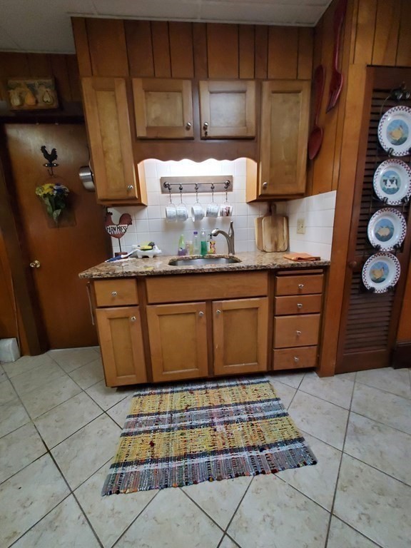 20 Baker Street Gardner, MA 01440 - Photo 5 of 15 a kitchen with a cabinets and window