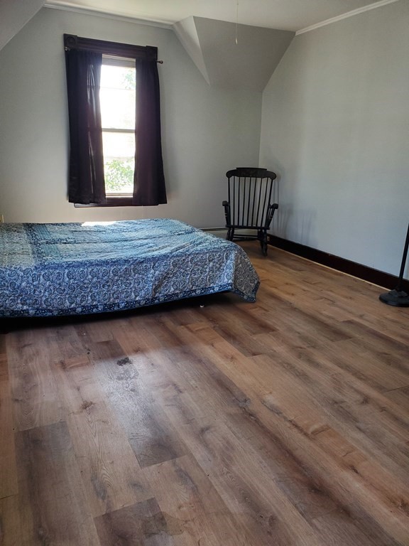 20 Baker Street Gardner, MA 01440 - Photo 10 of 15 a view of an empty room with wooden floor and a window