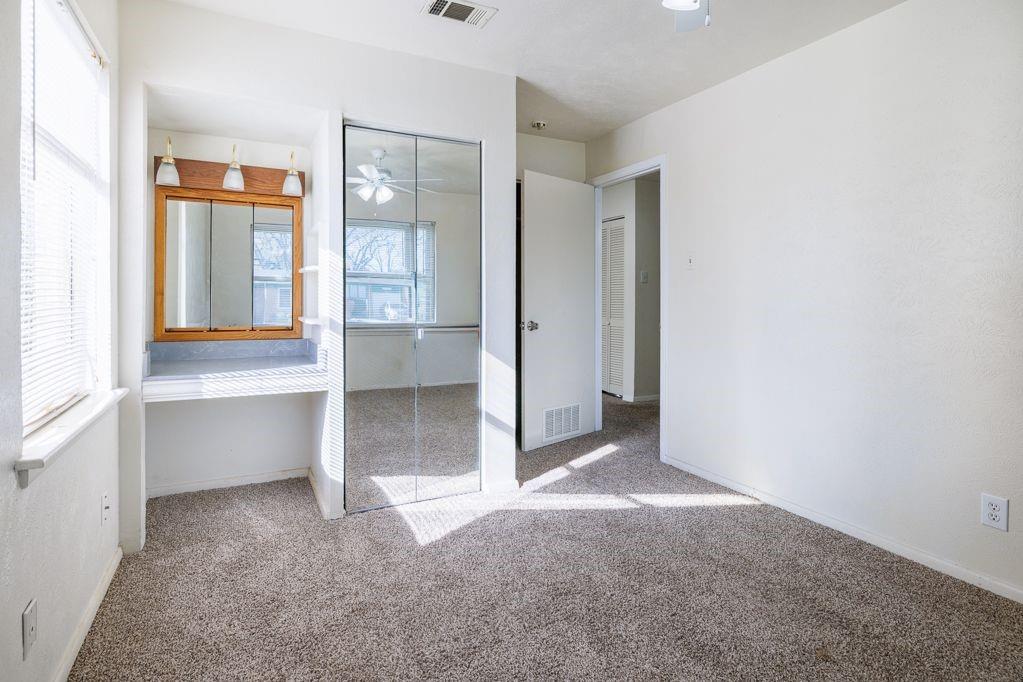 1723 Alhambra Street Dallas, TX 75217 - Photo 21 of 22 a view of an empty room with cabinet and entryway