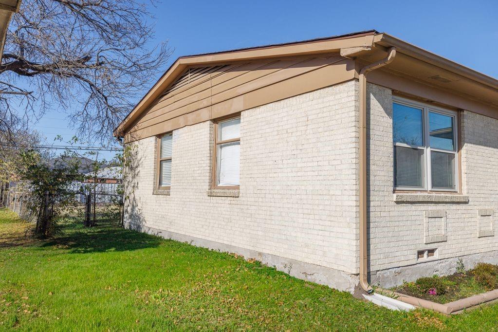1723 Alhambra Street Dallas, TX 75217 - Photo 8 of 22 a view of house with backyard