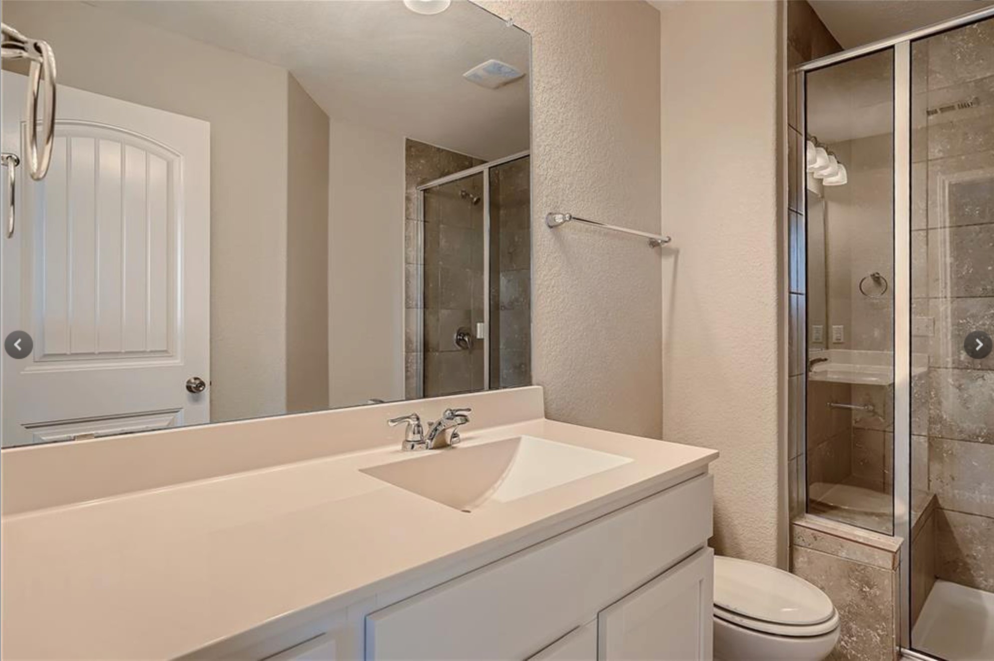 304 Cane River Road Pflugerville, TX 78660 - Photo 20 of 31 A refined bathroom featuring a clean vanity, spacious shower, and elegant fixtures.