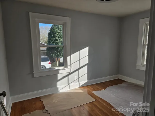 a view of a room that has a window in it