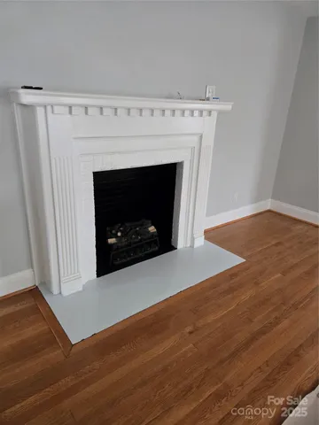 a living room with a fireplace