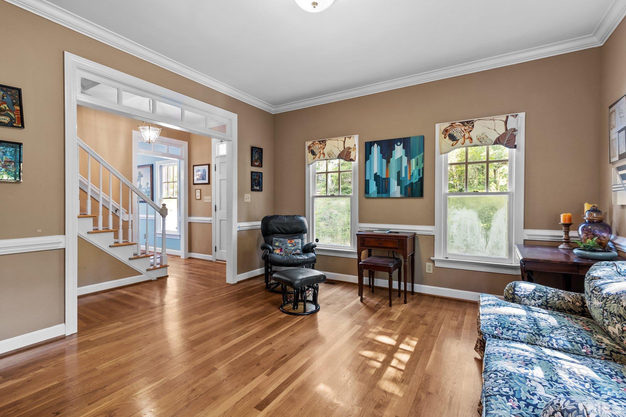 2516 Ashley Court Raleigh, NC 27607 - Photo 11 of 48 a living room with furniture fireplace and a table