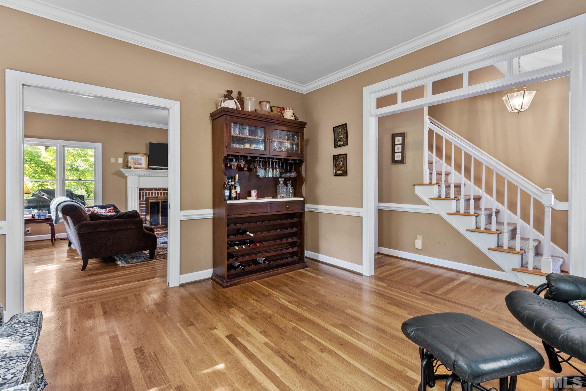 2516 Ashley Court Raleigh, NC 27607 - Photo 10 of 48 a view of living room filled with furniture and wooden floor