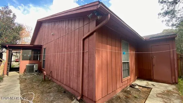 a view of backyard with cabin