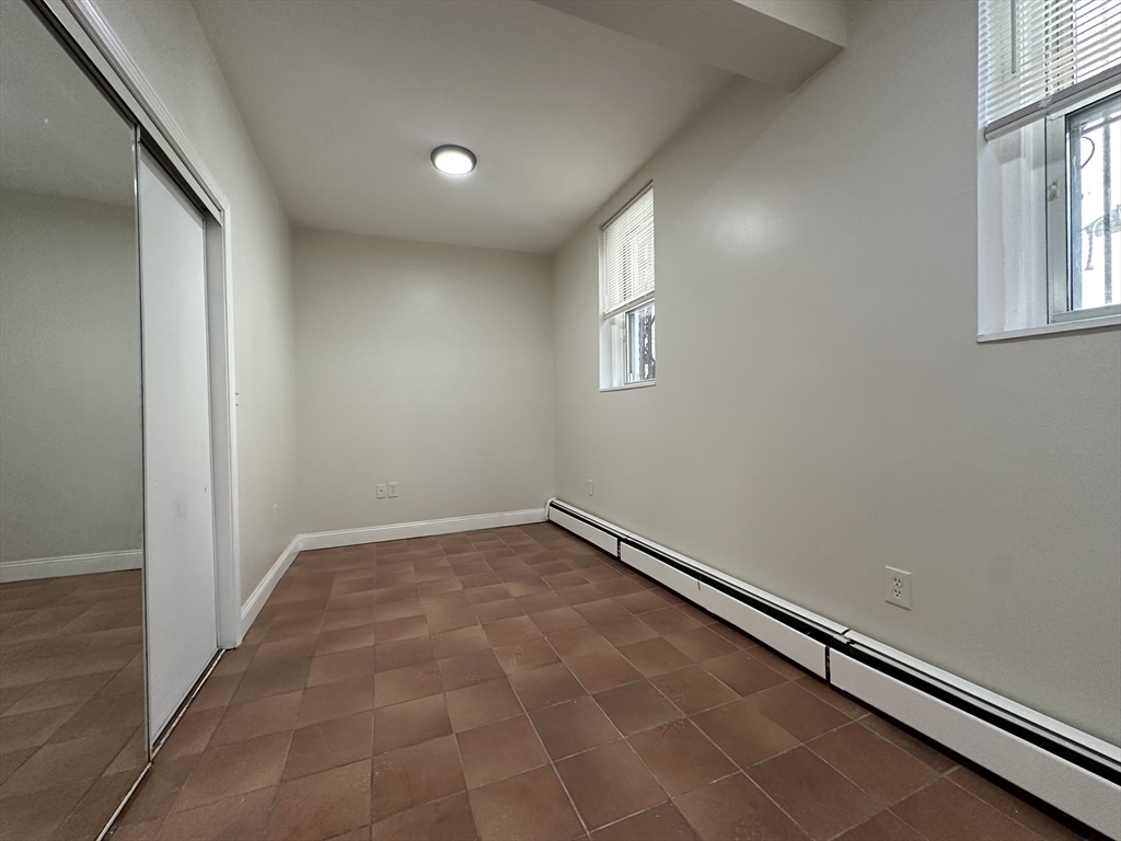 109 Strathmore Road, Unit B Boston, MA 02135 - Photo 5 of 9 a view of an empty room