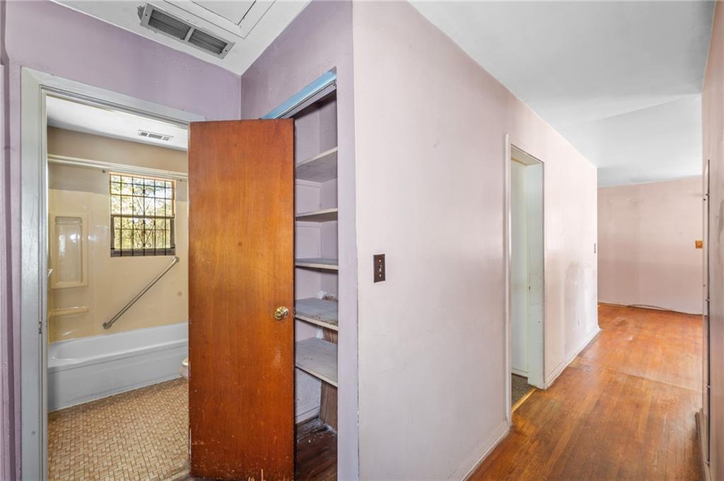 679 Bolton Road Northwest Atlanta, GA 30331 - Photo 21 of 30 a view of a bathroom with a glass door