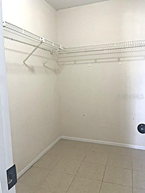 12 Pine Course Way Ocala, FL 34472 - Photo 24 of 29 a view of a room with racks on the wall