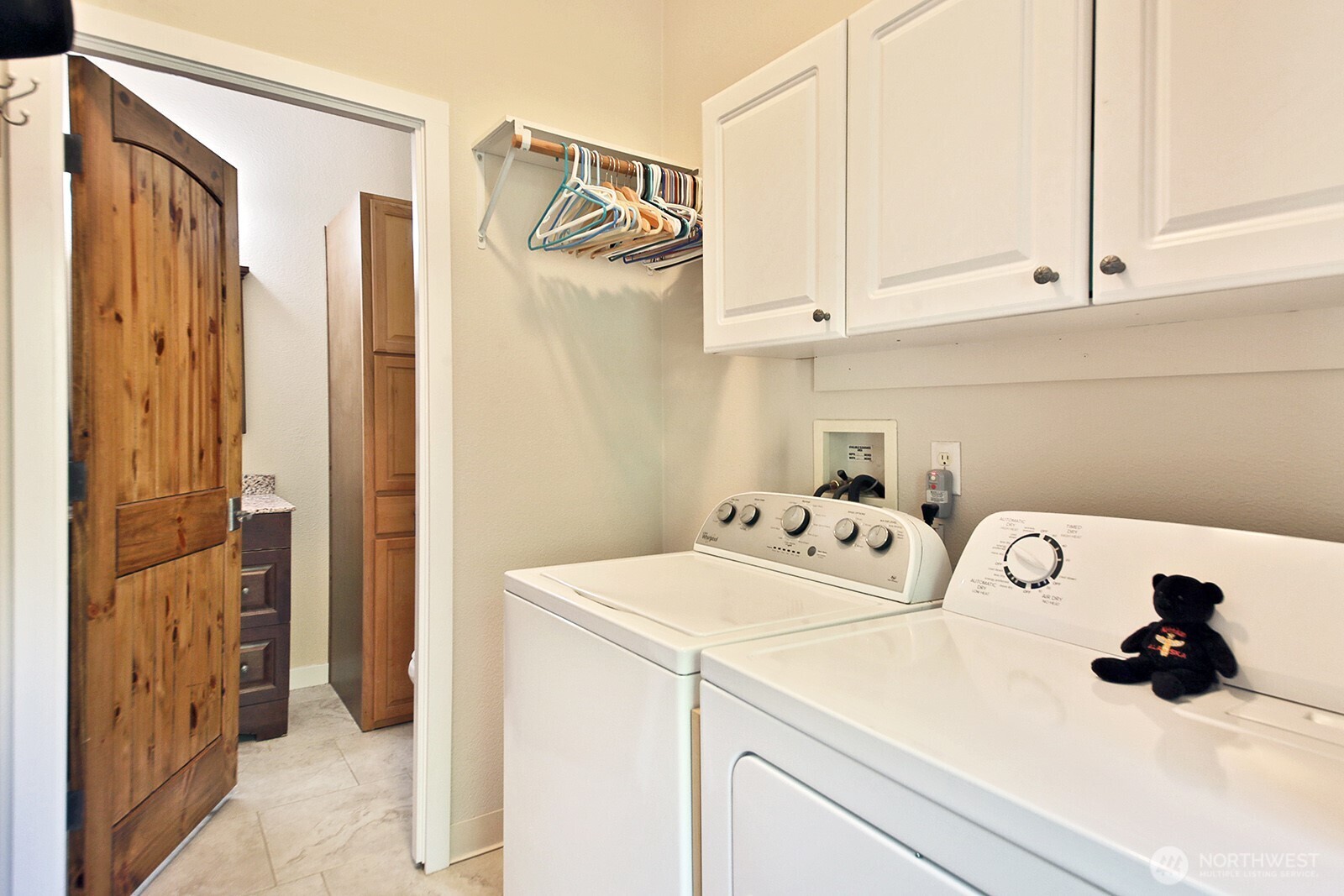 1677 Lancaster Road Freeland, WA 98249 - Photo 13 of 40 a utility room with dryer and washer