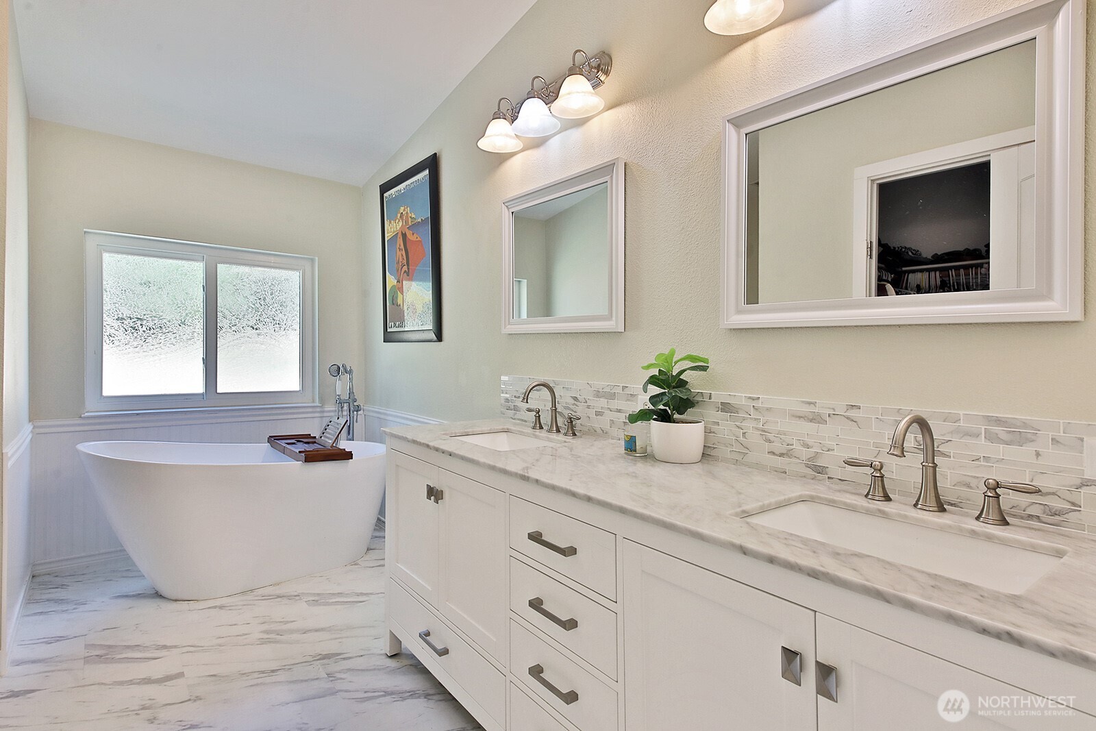 1677 Lancaster Road Freeland, WA 98249 - Photo 20 of 40 a bathroom with a granite countertop sink mirror and bathtub