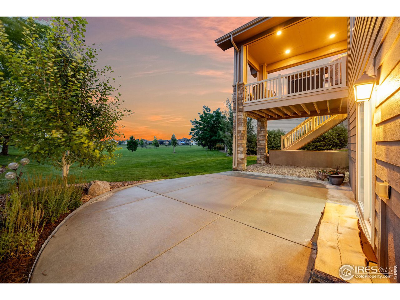 6178 Bay Meadows Drive Windsor, CO 80550 - Photo 37 of 40 a view of a house with a swimming pool