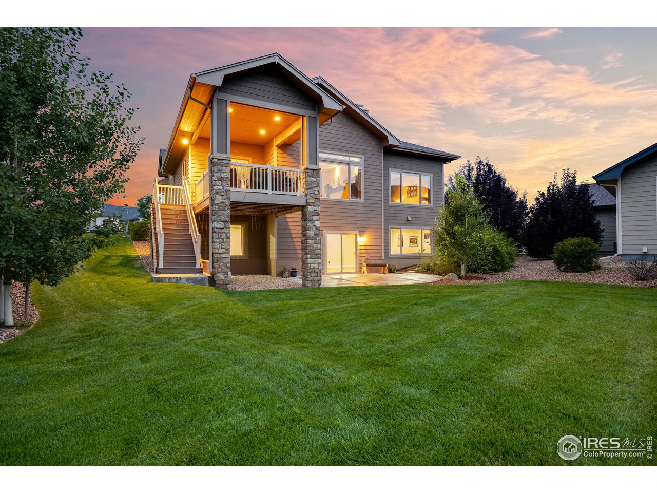 6178 Bay Meadows Drive Windsor, CO 80550 - Photo 4 of 40 a view of a house with a yard