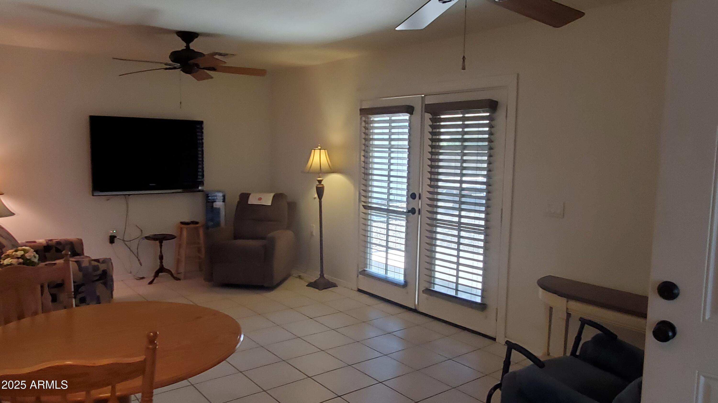 6343 East Ellis Street Mesa, AZ 85205 - Photo 3 of 16 French doors to back yard