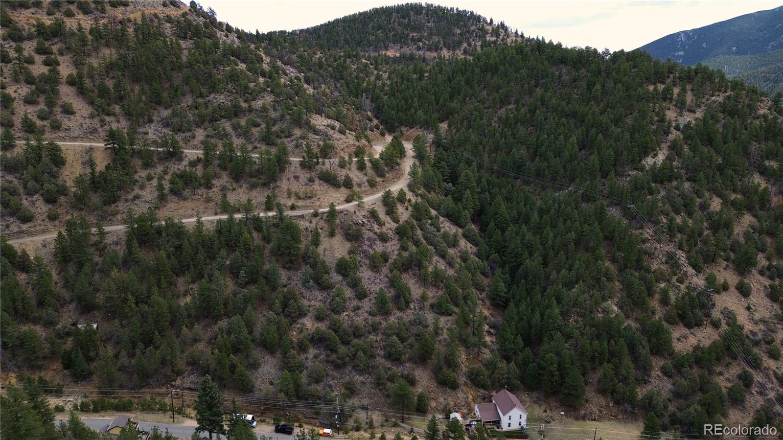 0 Virginia Canyon Road Idaho Springs, CO 80452 - Photo 3 of 45 a view of a forest with a mountain