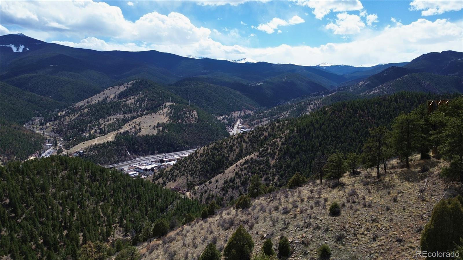 0 Virginia Canyon Road Idaho Springs, CO 80452 - Photo 38 of 45 a view of a house with a mountain in the background