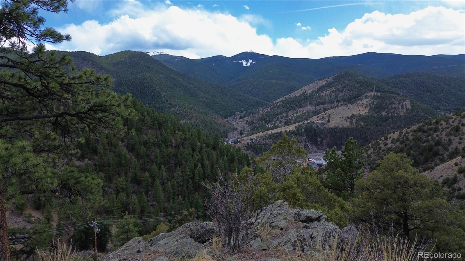 0 Virginia Canyon Road Idaho Springs, CO 80452 - Photo 39 of 45 a view of a house with a mountain