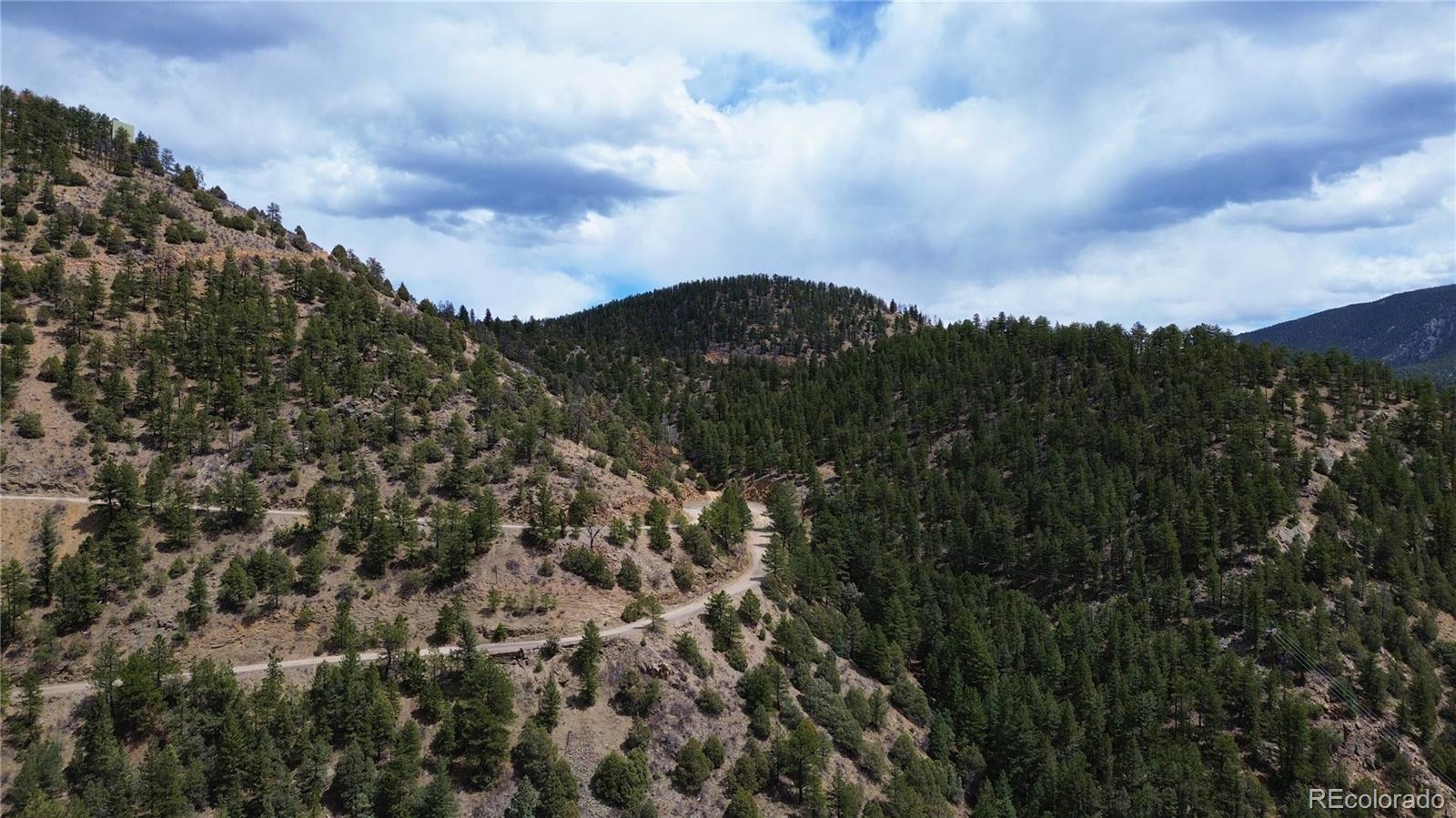 0 Virginia Canyon Road Idaho Springs, CO 80452 - Photo 42 of 45 a view of a city with lush green forest