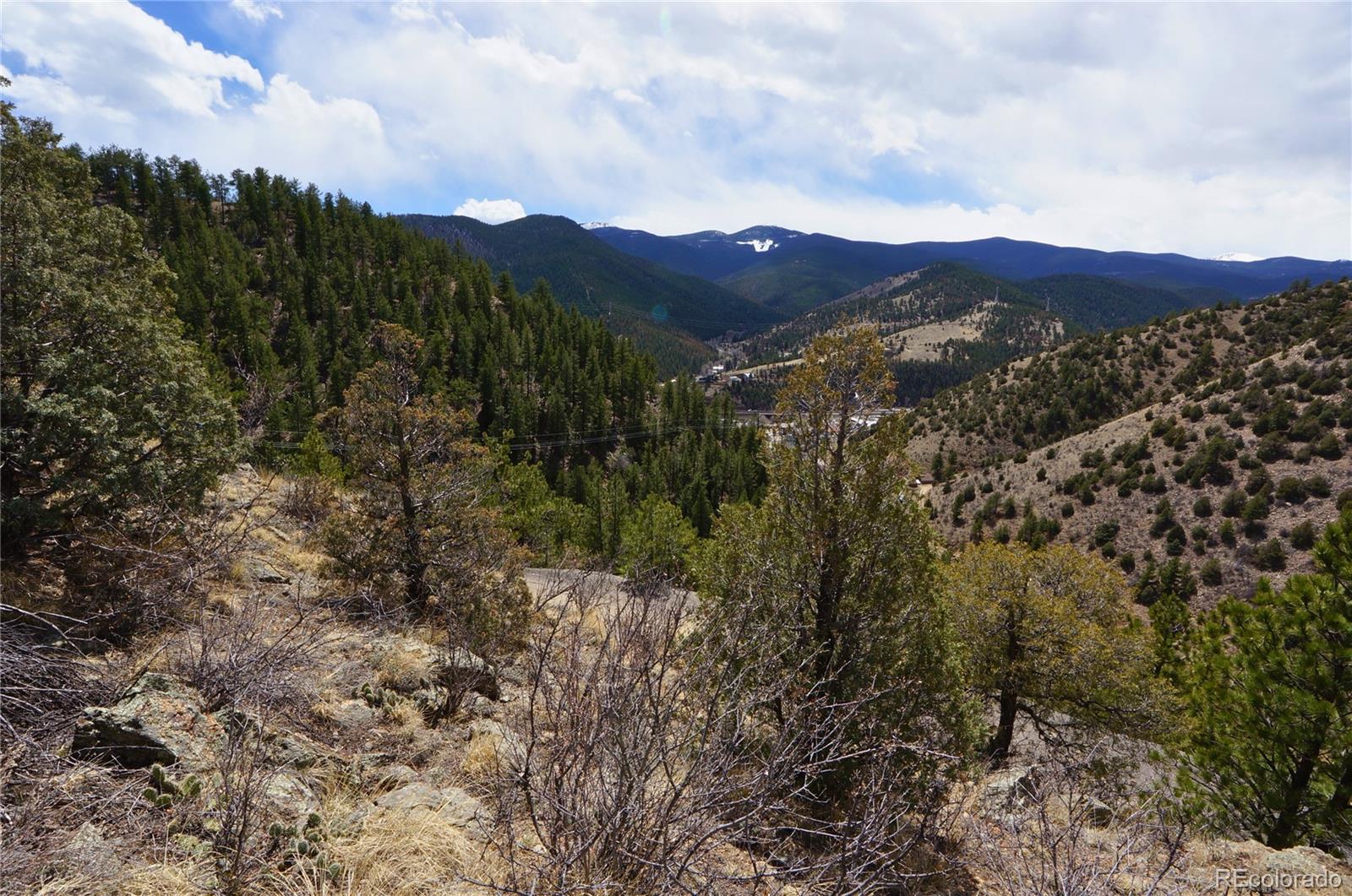 0 Virginia Canyon Road Idaho Springs, CO 80452 - Photo 6 of 45 a view of a city with mountains in the background