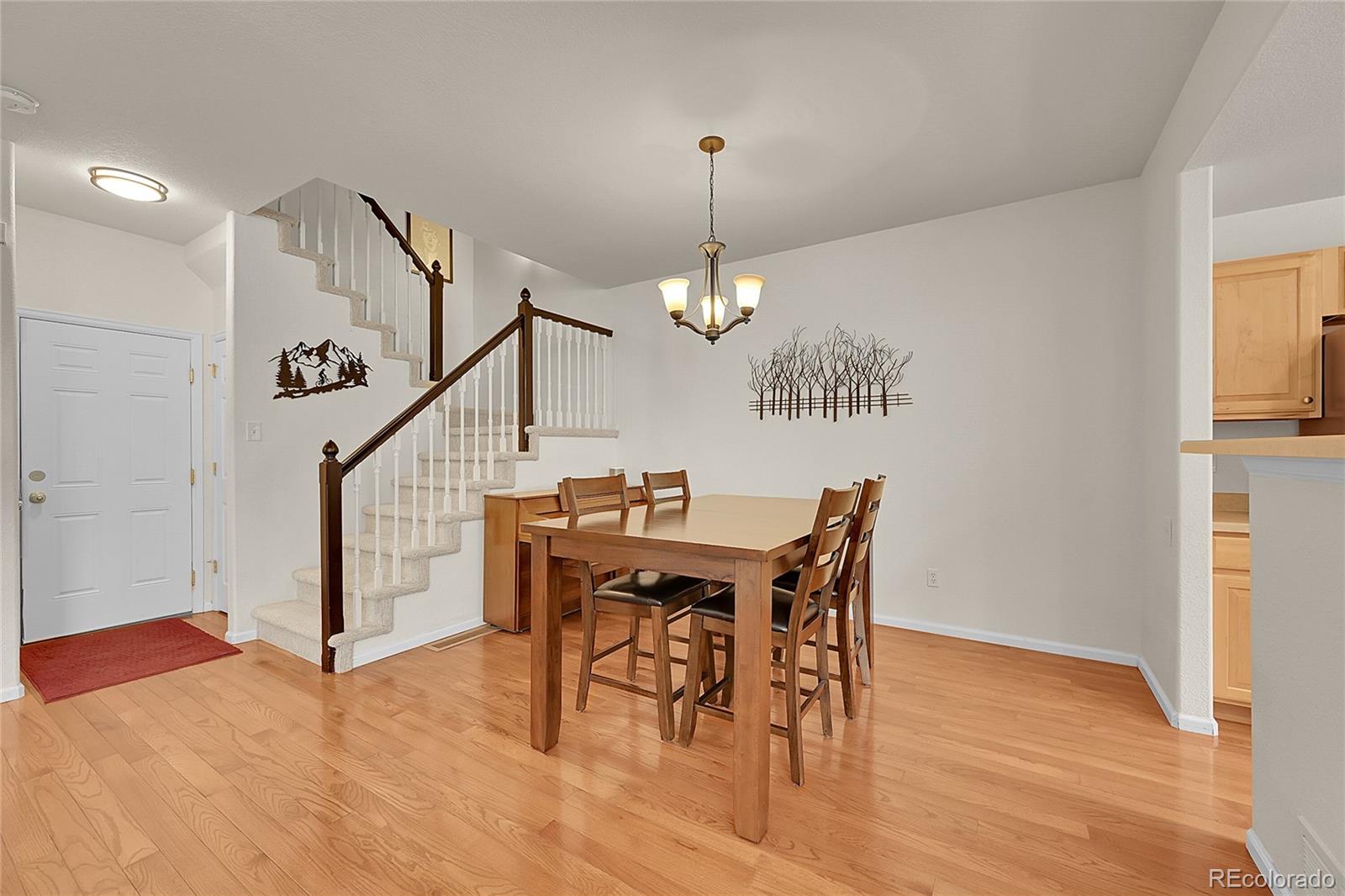 6539 Trailhead Road Highlands Ranch, CO 80130 - Photo 8 of 30 a view of a dining room with furniture