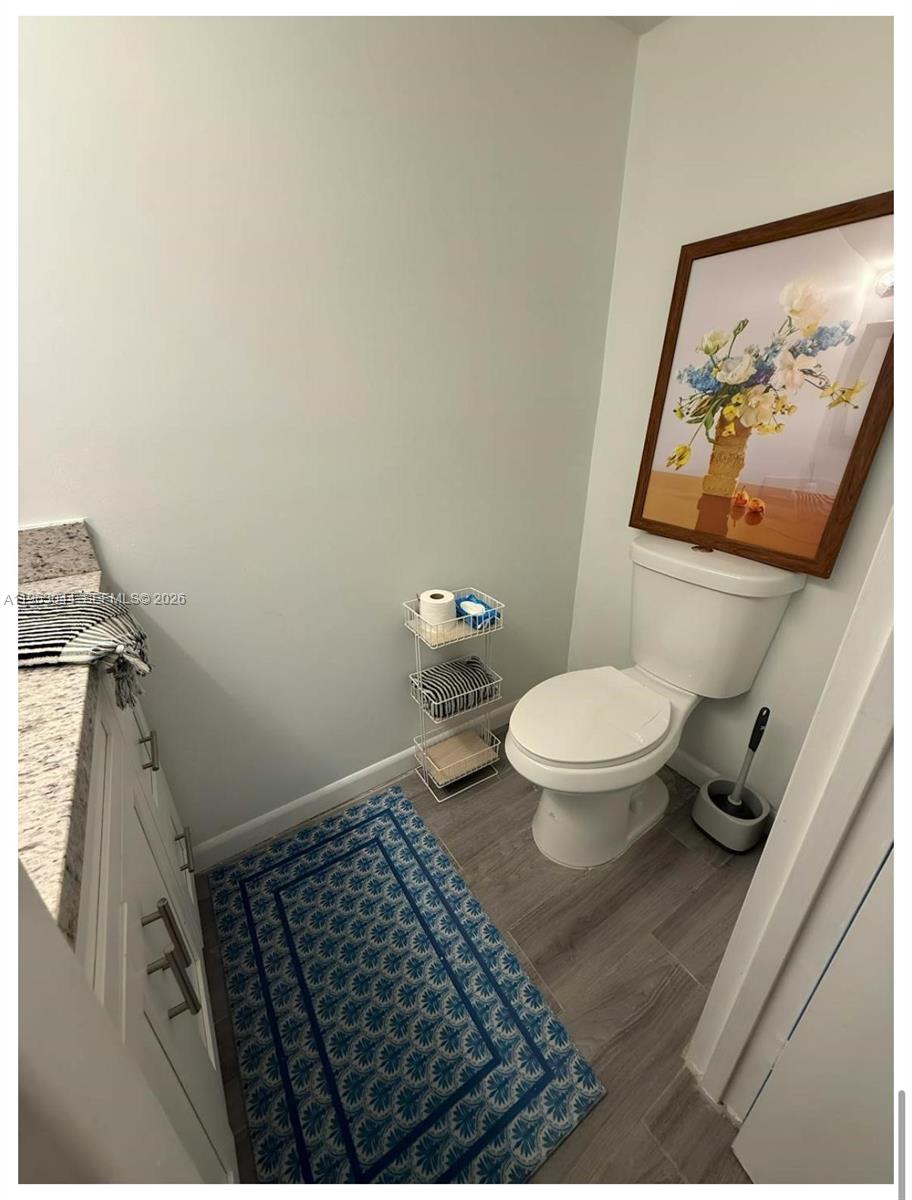 555 Northeast 15th Street, Unit 29G Miami, FL 33132 - Photo 9 of 11 a bathroom with a toilet and a shower