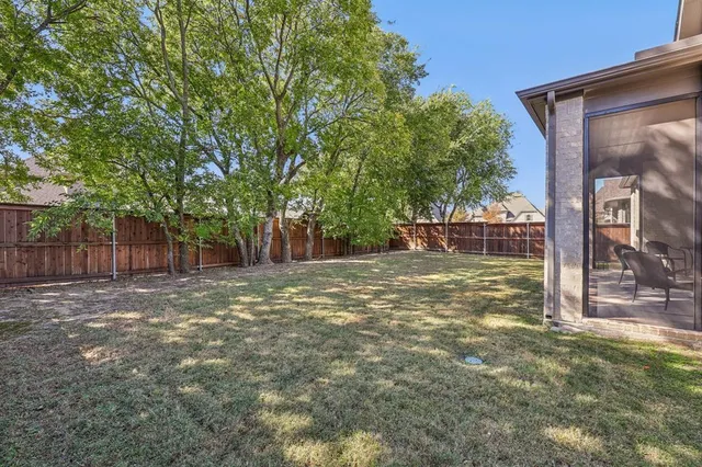 a view of a yard with an outdoor space