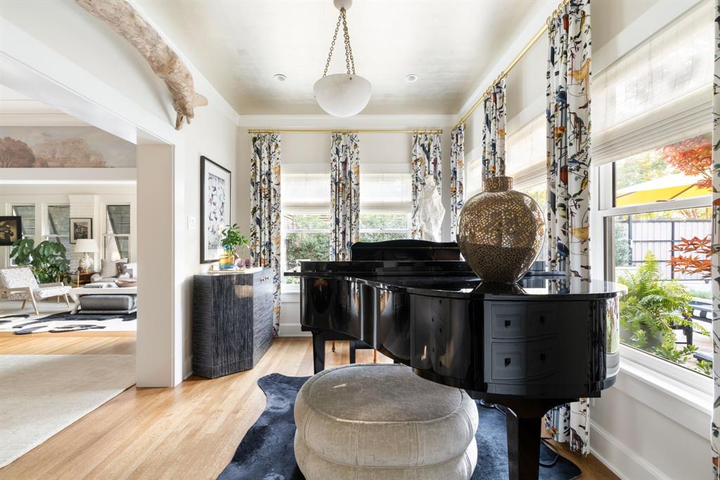 1203 North Windomere Avenue Dallas, TX 75208 - Photo 16 of 40 a living room with furniture and a floor to ceiling window