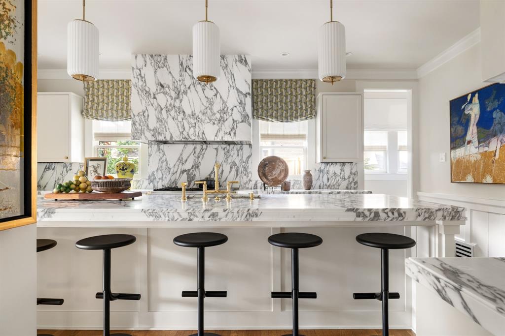 1203 North Windomere Avenue Dallas, TX 75208 - Photo 20 of 40 a kitchen with lots of counter space furniture and windows