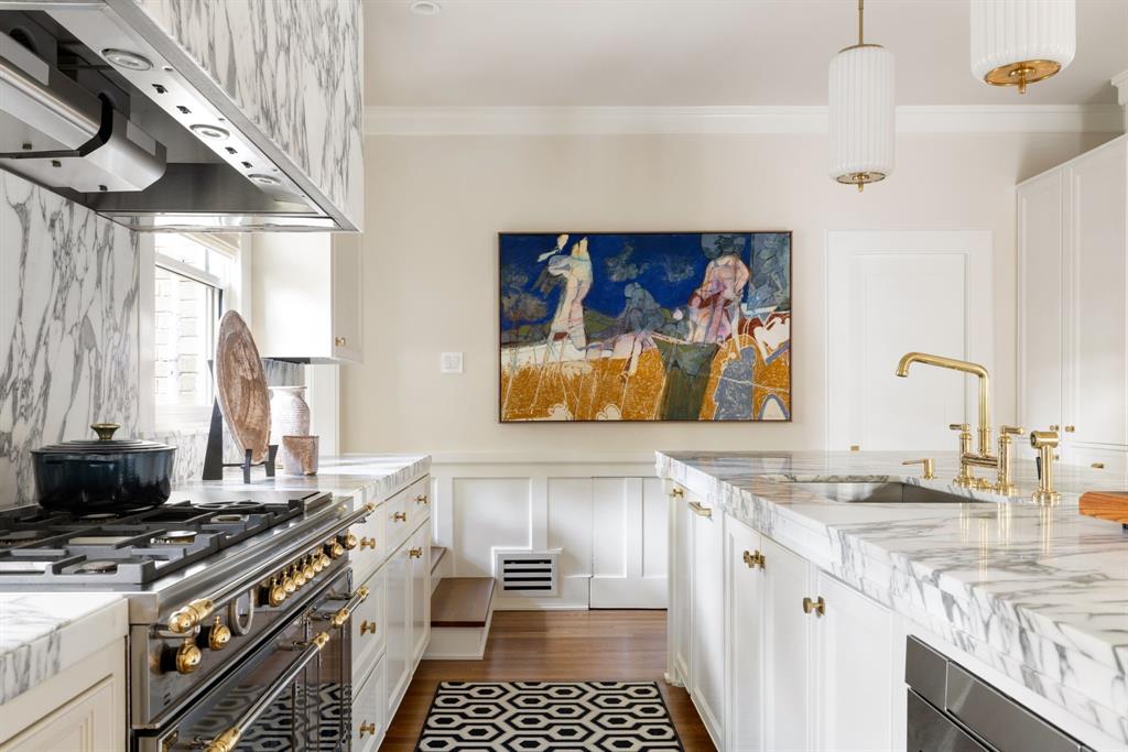1203 North Windomere Avenue Dallas, TX 75208 - Photo 23 of 40 a kitchen with a stove and a sink