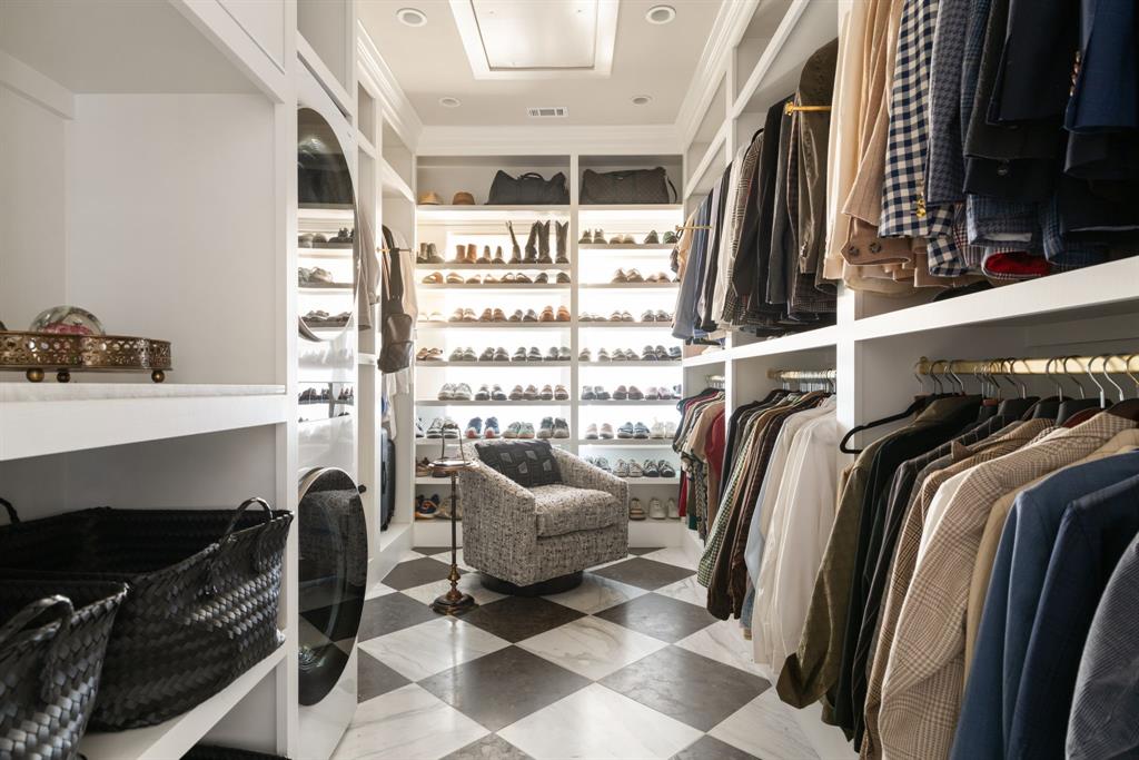 1203 North Windomere Avenue Dallas, TX 75208 - Photo 31 of 40 a view of walk in closet with clothes and shoes