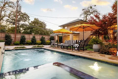swimming pool with outdoor seating