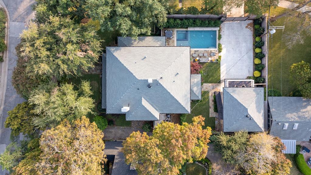 1203 North Windomere Avenue Dallas, TX 75208 - Photo 40 of 40 an aerial view of a house with a yard and large trees