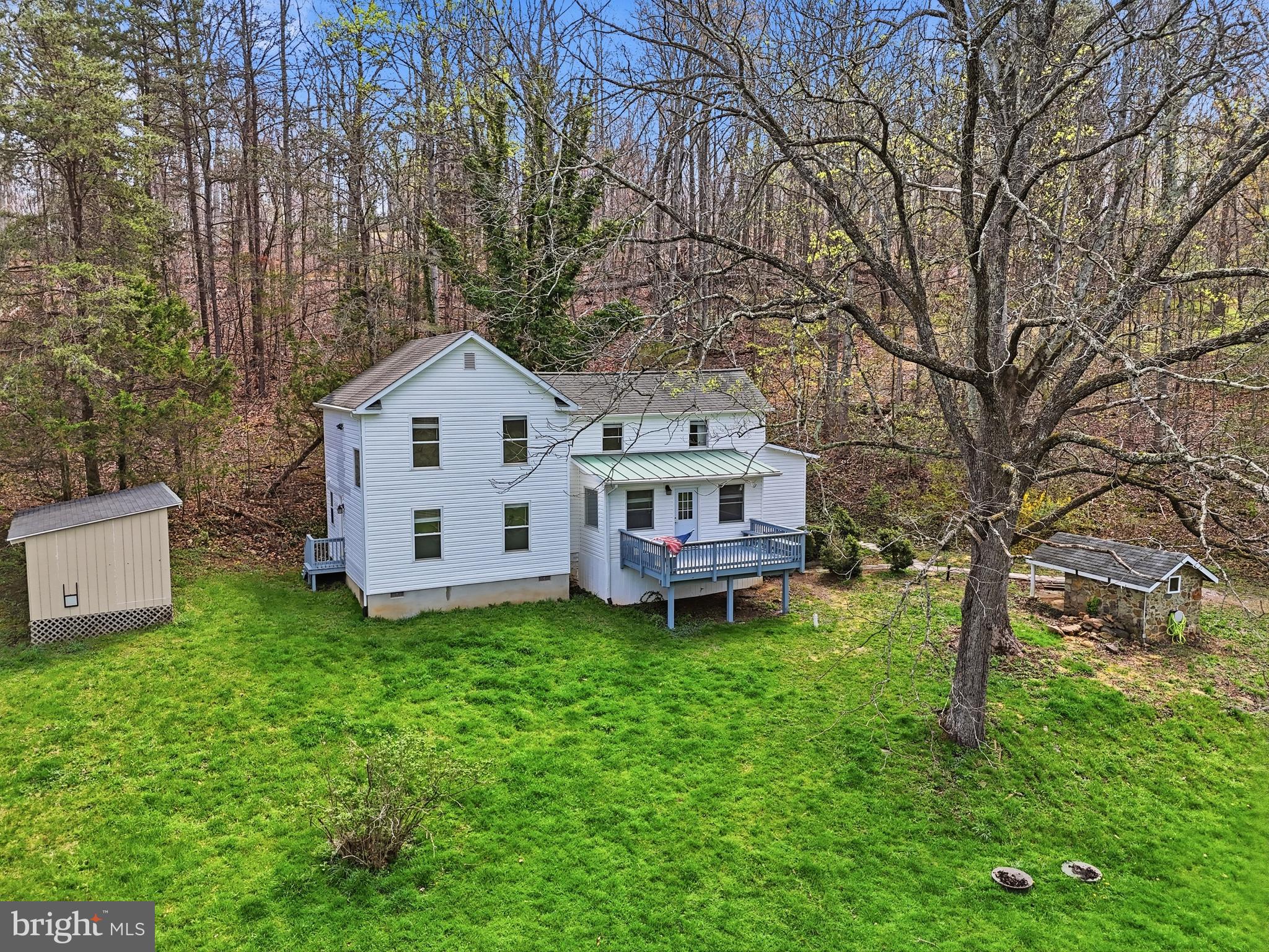 6537 Watery Mountain Road Warrenton, VA 20186 - Photo 1 of 44 a view of a house with a yard and sitting area