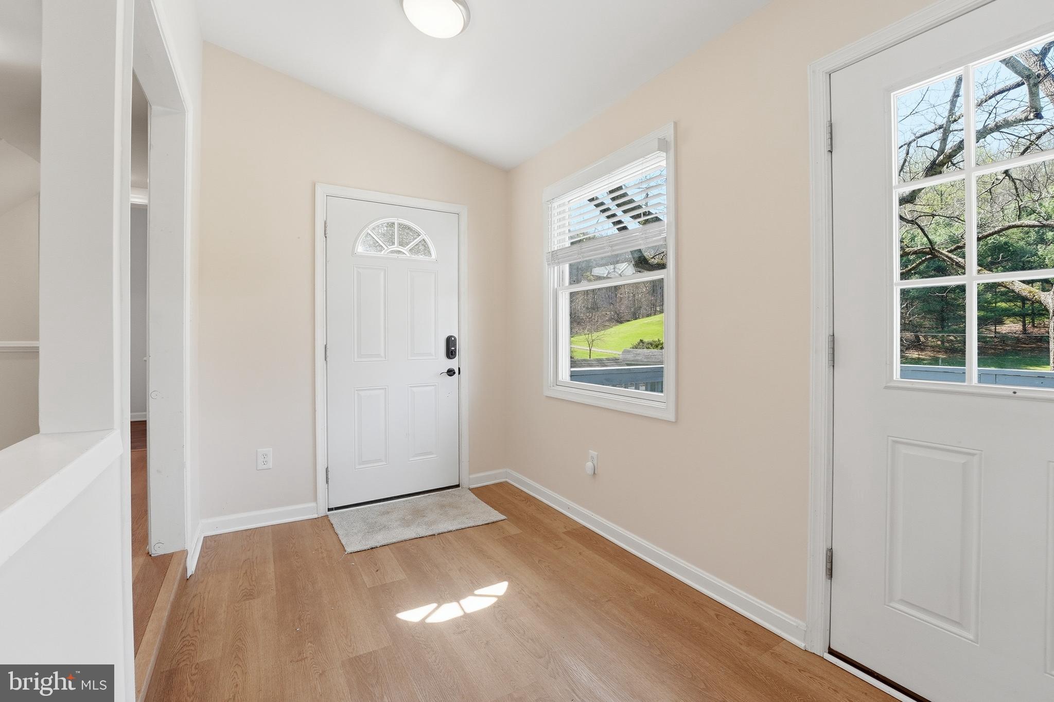 6537 Watery Mountain Road Warrenton, VA 20186 - Photo 10 of 44 an empty room with windows and closet