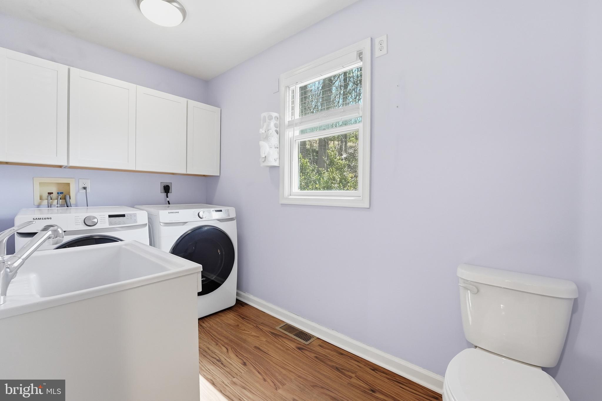 6537 Watery Mountain Road Warrenton, VA 20186 - Photo 15 of 44 a utility room with dryer and washer