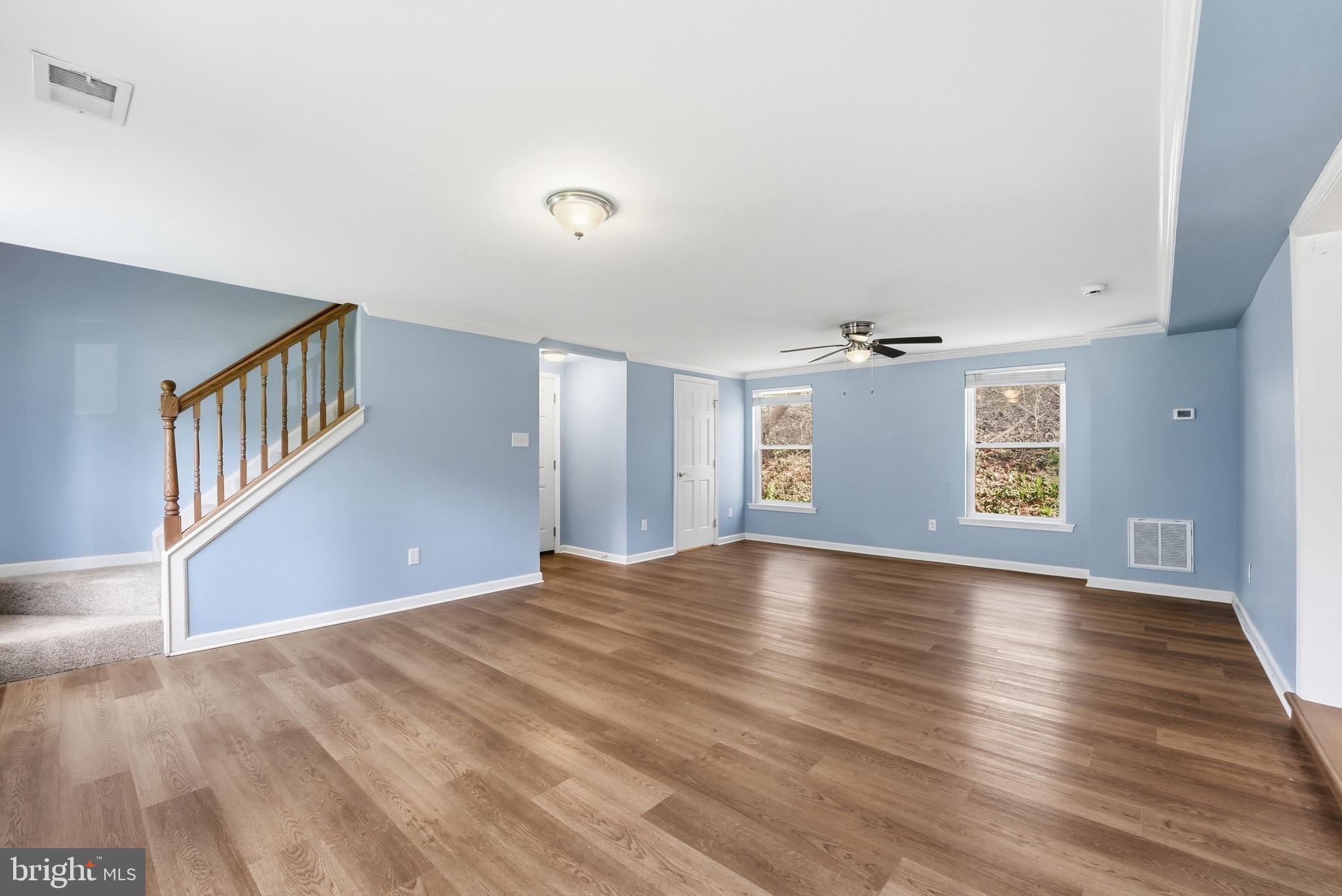 6537 Watery Mountain Road Warrenton, VA 20186 - Photo 17 of 44 wooden floor in an empty room with a window