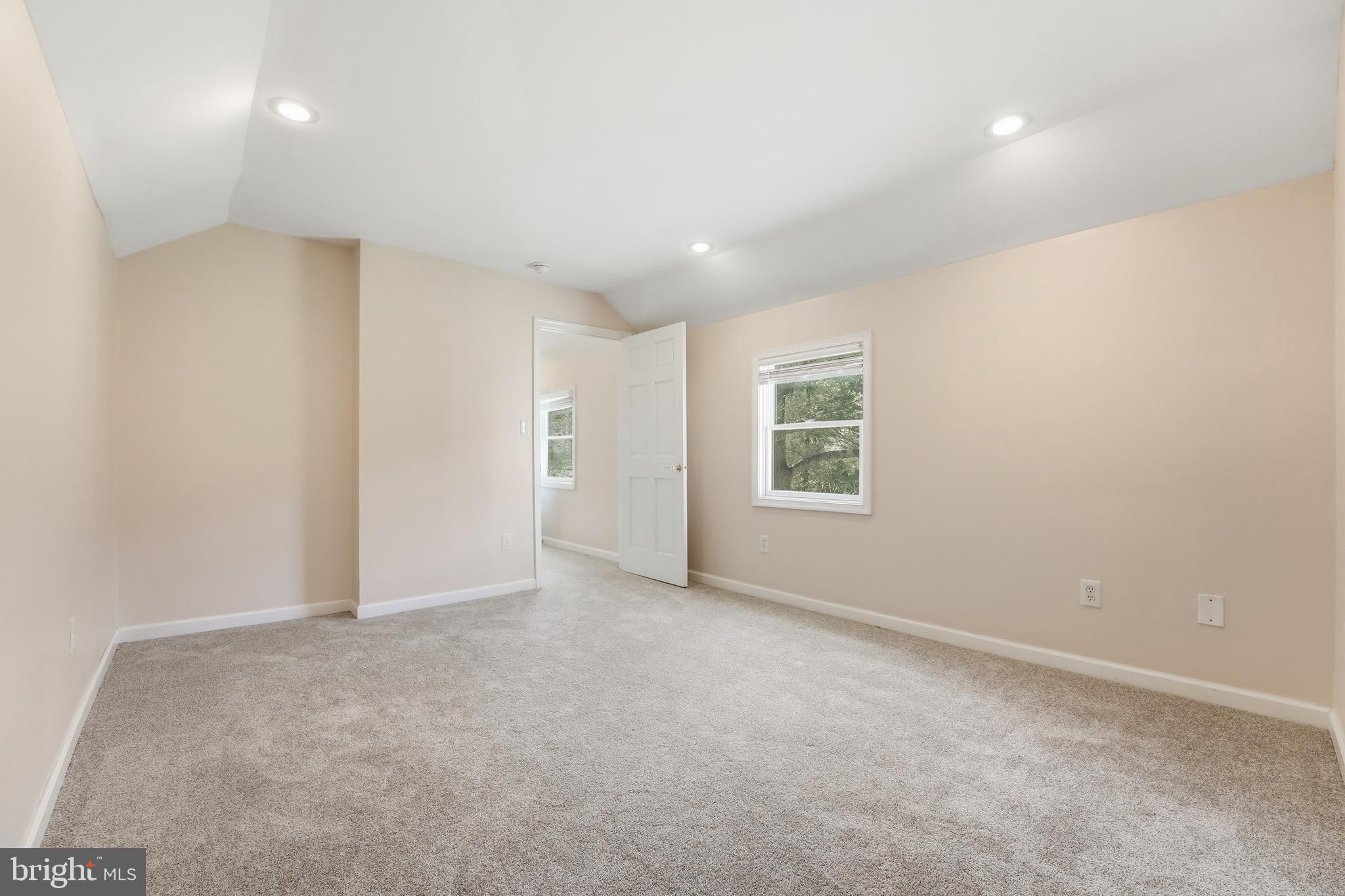 6537 Watery Mountain Road Warrenton, VA 20186 - Photo 27 of 44 an empty room with windows and closet
